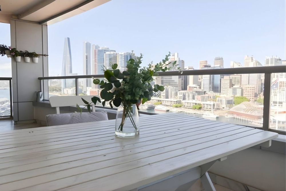 Balcony table with the city skyline behind