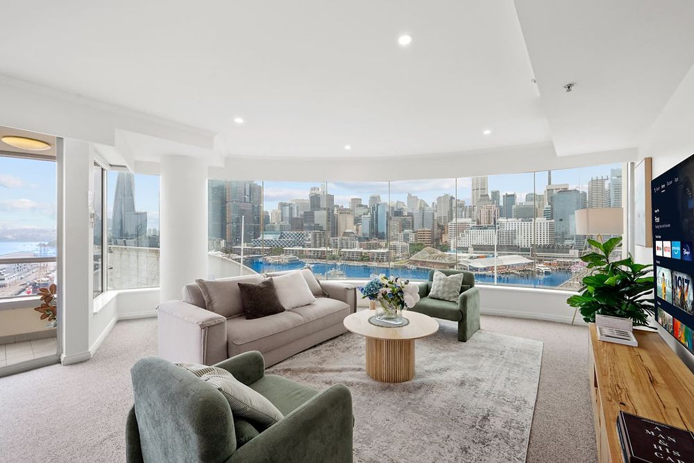 Panoramic city skyline and waterfront view from the living room